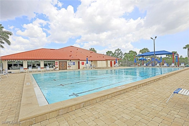13268 Whitehaven Ln Unit 102, Fort Myers, FL 33966 - community pool featuring a patio