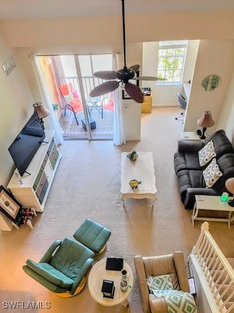 living room featuring ceiling fan