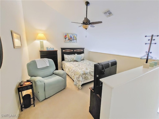 bedroom featuring ceiling fan and light carpet