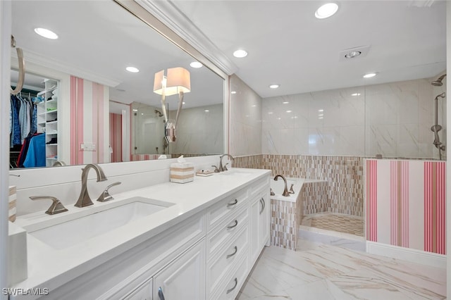 bathroom featuring vanity, shower with separate bathtub, and tile walls