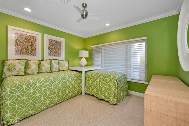 bedroom with carpet floors, ceiling fan, and ornamental molding