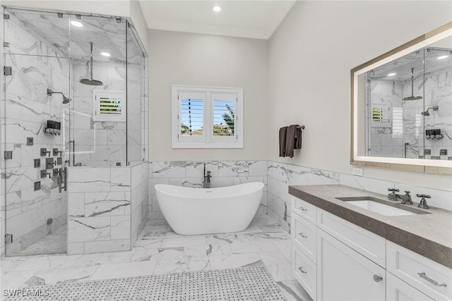 bathroom featuring heating unit, vanity, tile walls, and independent shower and bath