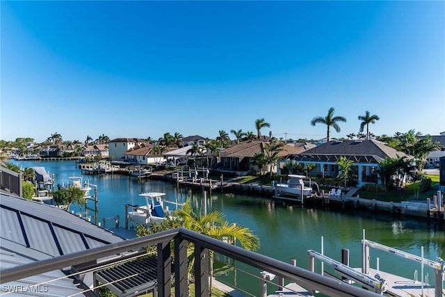 1631 Galleon Ct, Marco Island, FL 34145 - water view featuring a boat dock and nearby suburban area