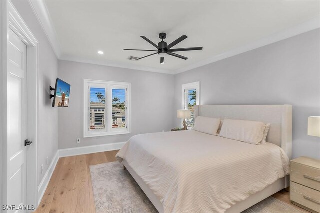 1631 Galleon Ct, Marco Island, FL 34145 - bedroom with light wood-type flooring, multiple windows, ornamental molding, recessed lighting, and ceiling fan