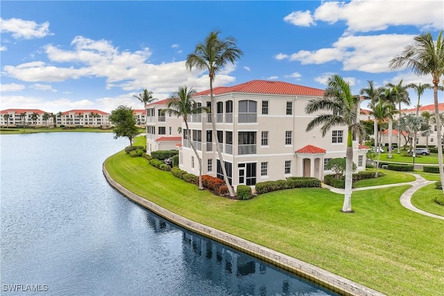 view of building exterior featuring a water view