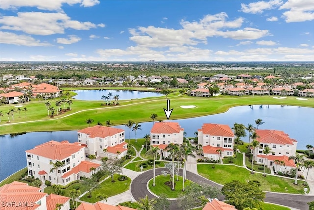 aerial view featuring a residential view, a water view, and golf course view