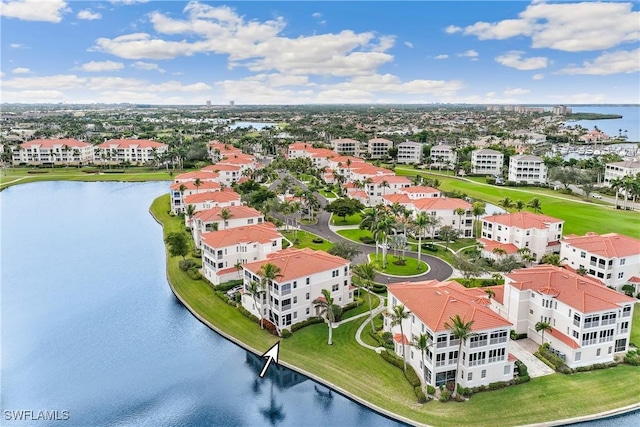 bird's eye view with a residential view and a water view