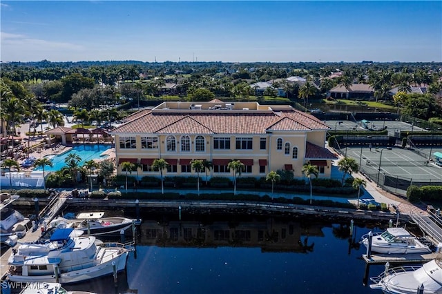 birds eye view of property with a water view