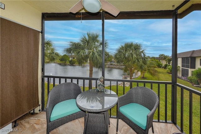 balcony featuring a water view