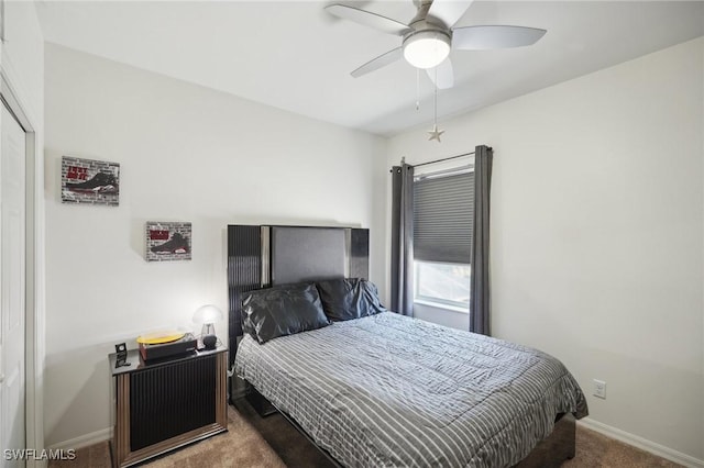 bedroom with ceiling fan and carpet floors