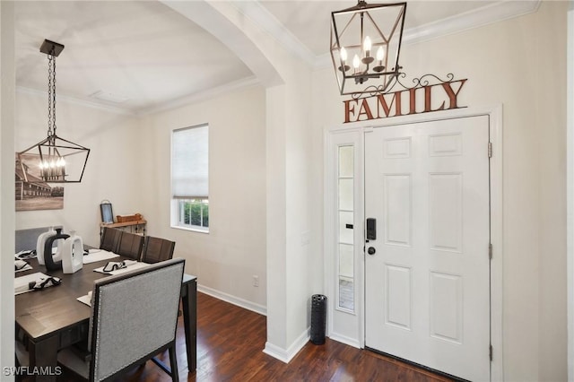 entrance foyer featuring dark hardwood / wood-style floors and ornamental molding