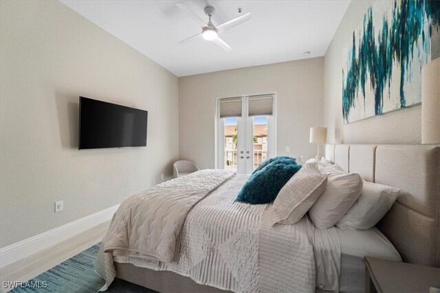 bedroom with hardwood / wood-style flooring, ceiling fan, and access to exterior