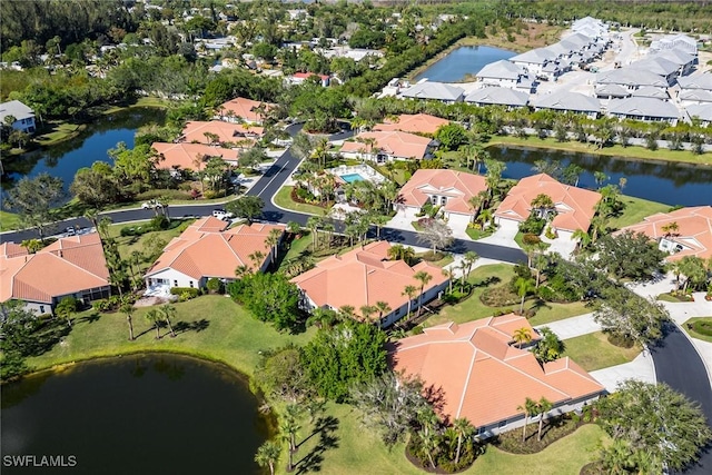 bird's eye view with a water view