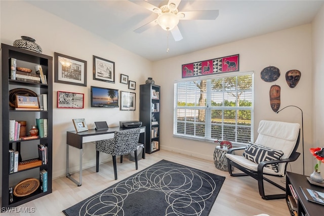 office space with hardwood / wood-style flooring and ceiling fan