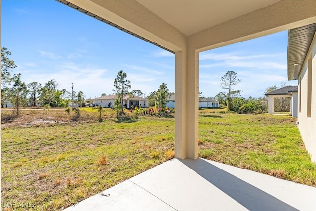 view of yard featuring a patio