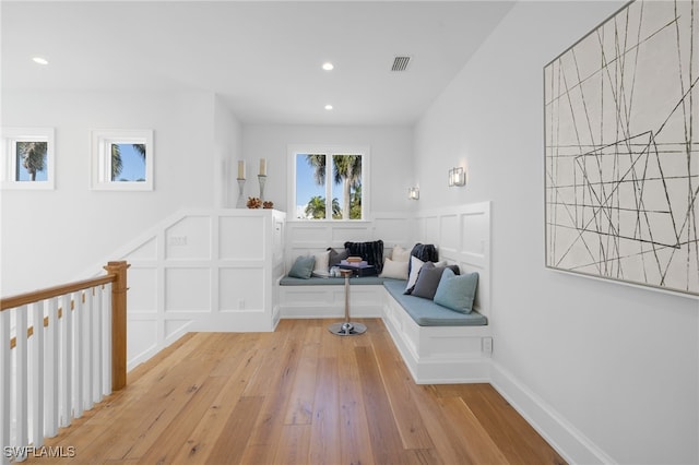 sitting room featuring light wood-type flooring