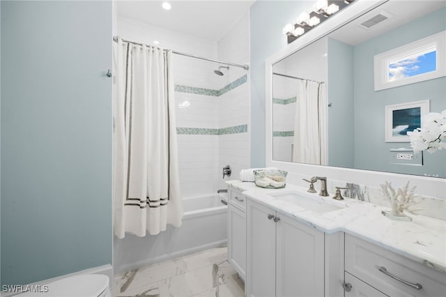 full bathroom featuring toilet, vanity, and shower / bath combo with shower curtain