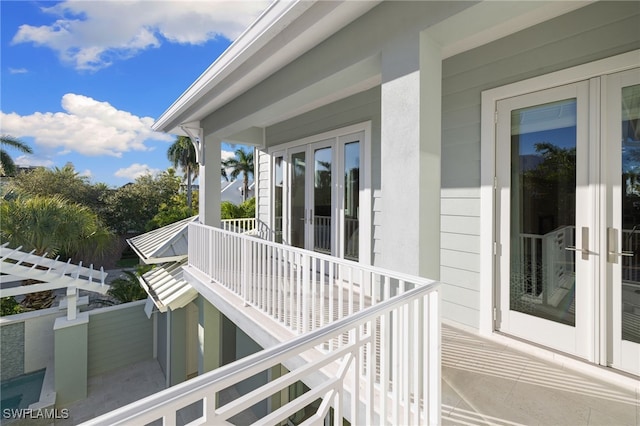 wooden terrace featuring french doors