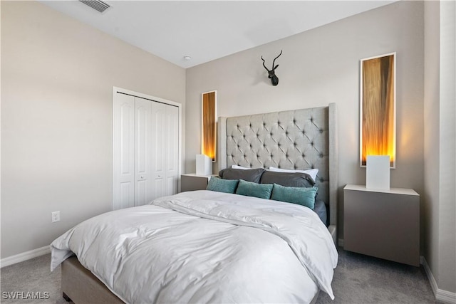 carpeted bedroom with a closet