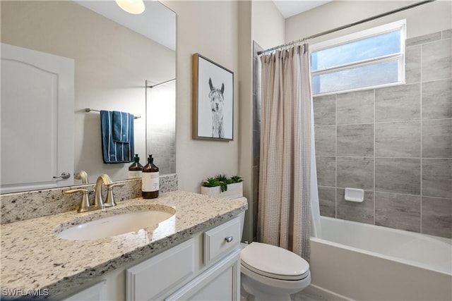 full bathroom with toilet, vanity, and shower / tub combo with curtain