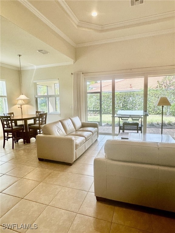 tiled living room featuring ornamental molding