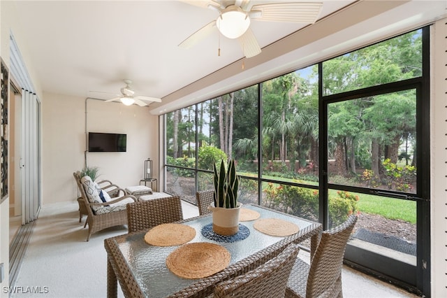 sunroom with ceiling fan and a healthy amount of sunlight