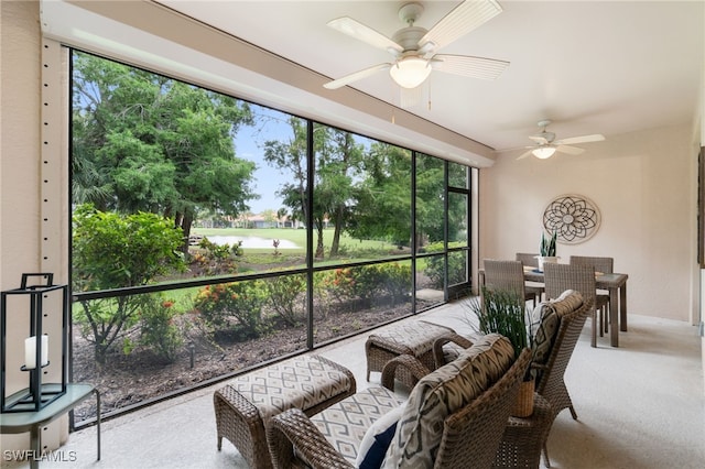 sunroom / solarium with ceiling fan