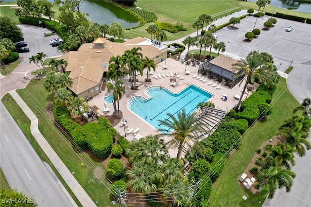 birds eye view of property featuring a water view