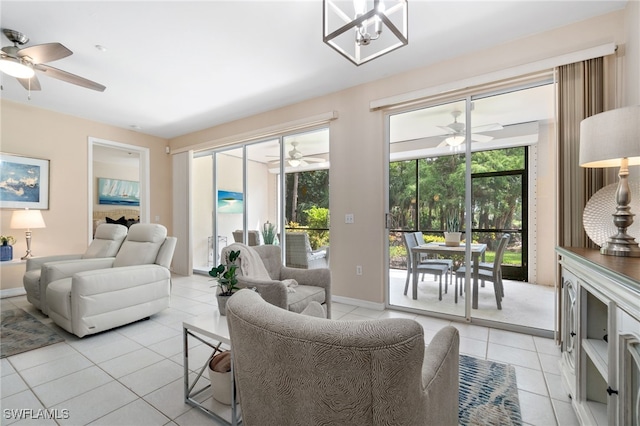 living room with light tile patterned floors and a notable chandelier