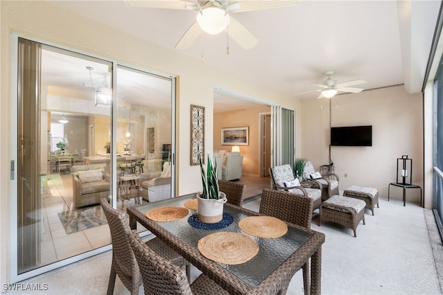 dining room featuring ceiling fan