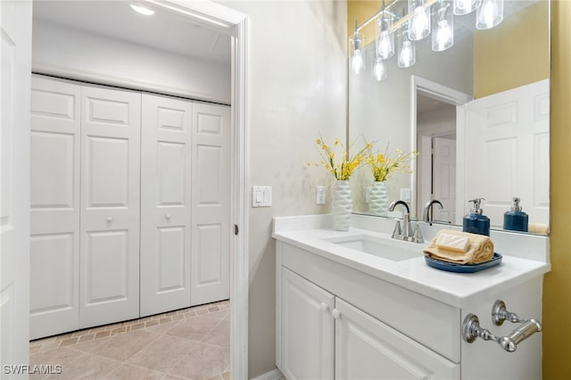 bathroom featuring tile patterned floors and vanity