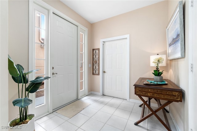 entryway featuring light tile patterned floors