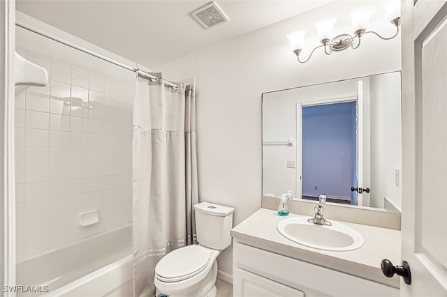 full bathroom with vanity, toilet, and shower / bath combo with shower curtain