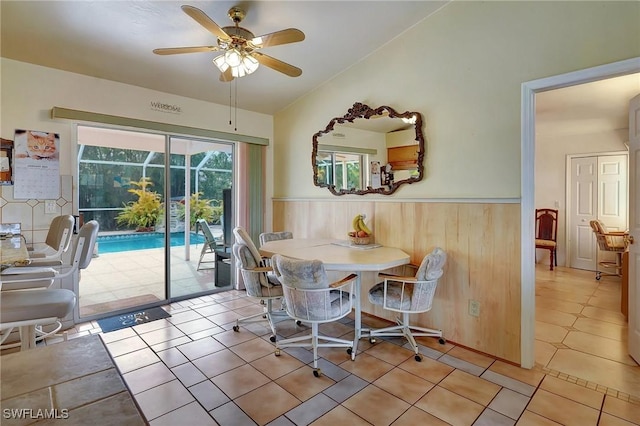 dining room with ceiling fan and light tile patterned floors