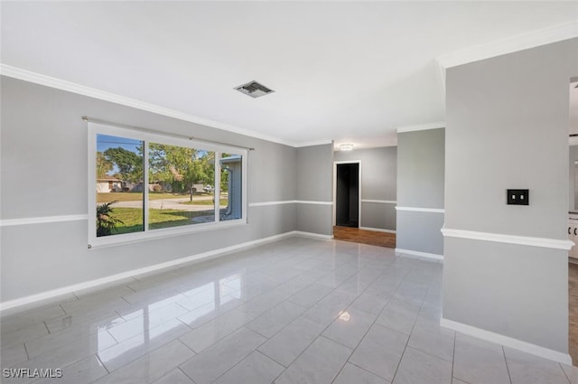 tiled empty room with ornamental molding