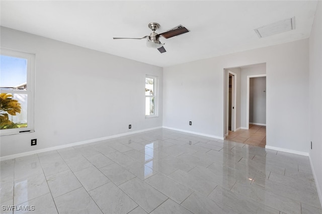 empty room featuring ceiling fan