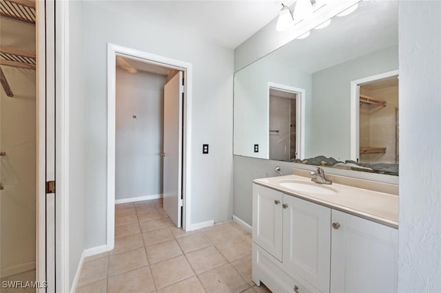 bathroom featuring tile patterned floors and vanity