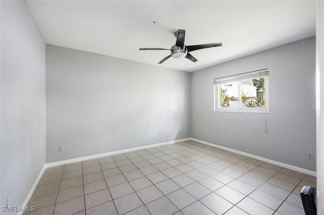 unfurnished room with light tile patterned floors and ceiling fan