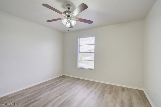 spare room with ceiling fan and light hardwood / wood-style flooring