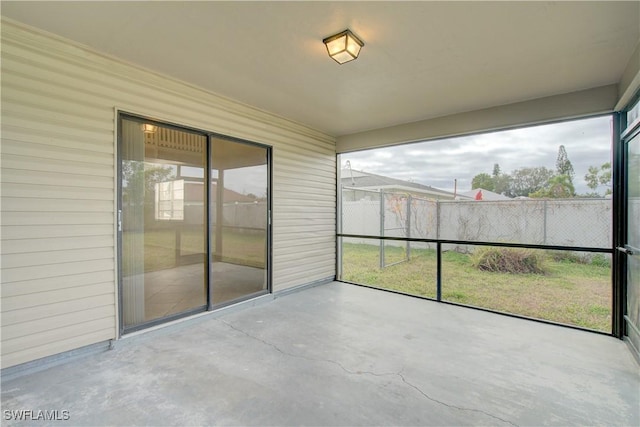 unfurnished sunroom with plenty of natural light