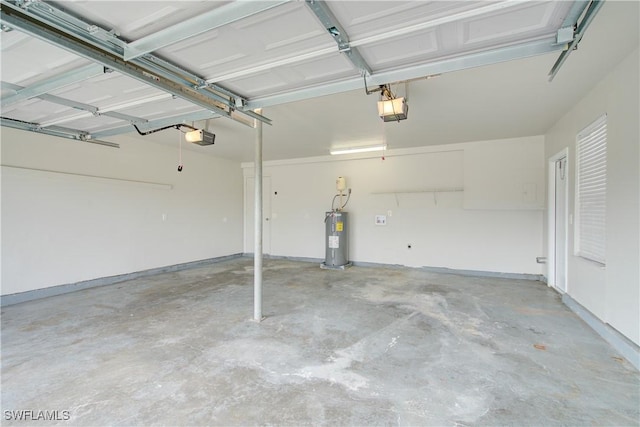 garage with water heater and a garage door opener