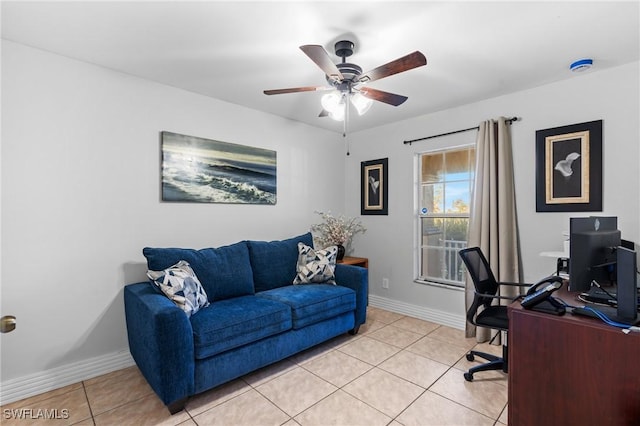 tiled office featuring ceiling fan