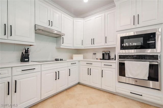 kitchen featuring black electric stovetop, white cabinetry, built in microwave, and stainless steel oven