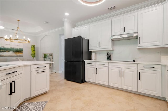 kitchen with ornamental molding, black appliances, decorative light fixtures, white cabinets, and a chandelier