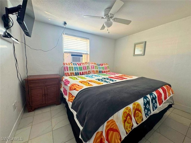 bedroom featuring a textured ceiling, ceiling fan, and cooling unit