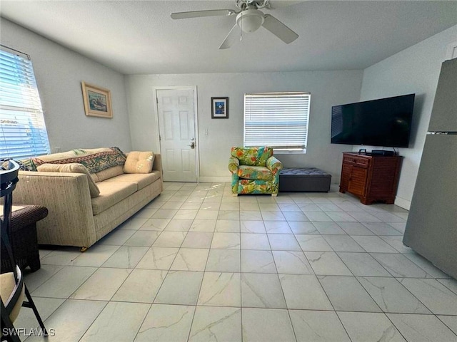 living room with ceiling fan