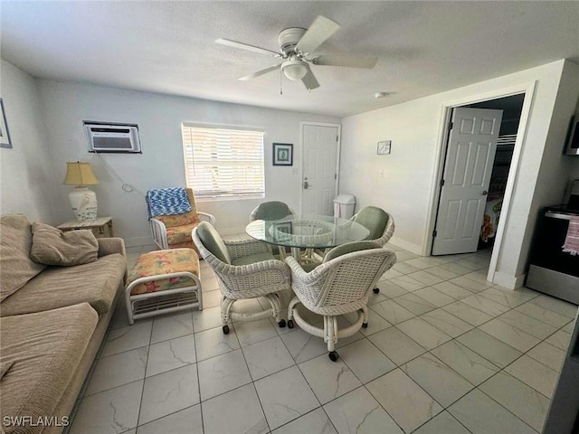 dining room with marble finish floor, a wall mounted air conditioner, a ceiling fan, and baseboards