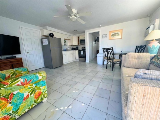 living room with ceiling fan