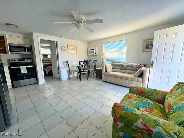 living room featuring marble finish floor and ceiling fan