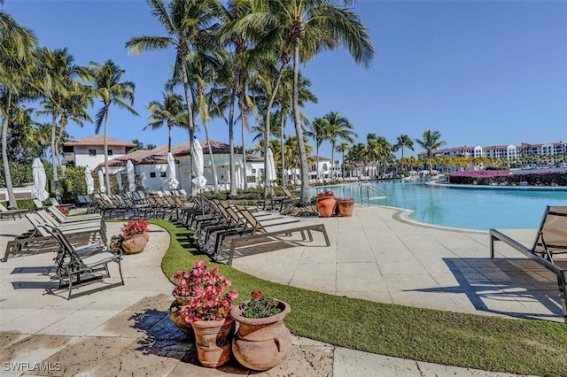 view of swimming pool with a patio